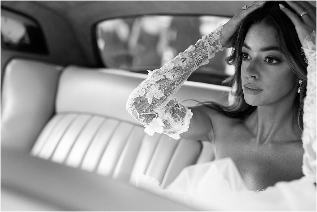 Bride in car fixing hair at Philadelphia editorial wedding at Switch House