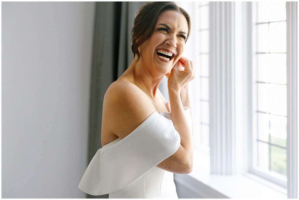 Bride getting ready in bridal suite at Natirar Mansion a New Jersey wedding